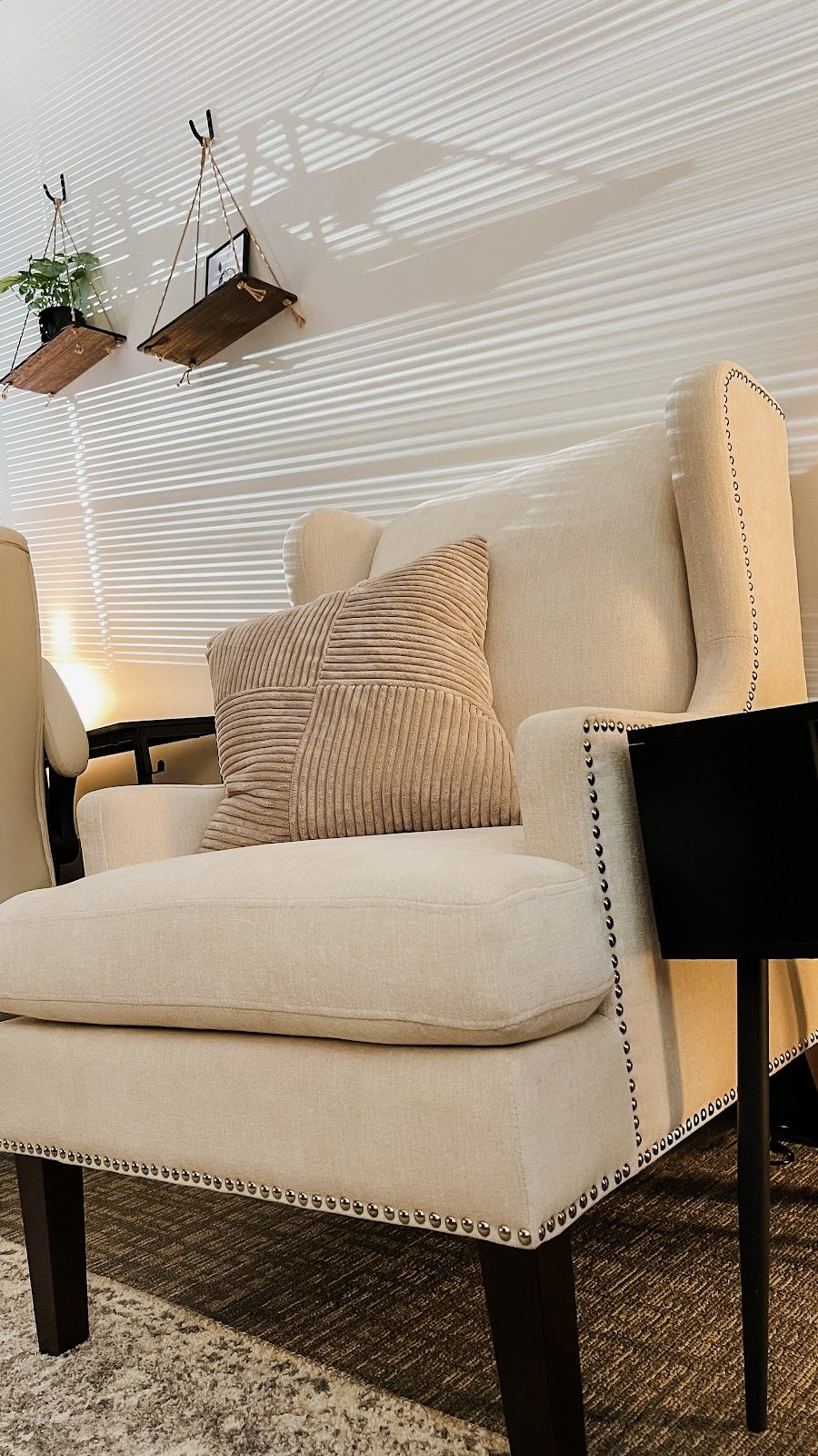Modern therapy therapy room of Therapy Worthwhile featuring a cream white armchair